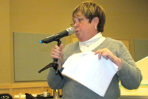 Joanne Morris of Oroville addresses the crowd at the Okanogan County Public Utilities District’s information meeting on Tuesday, April 19. She said the straw that broke the camel’s back for her in regards to the PUD’s rates was when she realized she