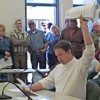 <span style='font-size:9.0pt;font-family:Worldwide;'>Photo by Jennifer Marshall</span><p class=PhotoCutline align=left style='text-align:left'>Jon Wyss, chairman ofthe Okanogan County Coalition for Property Rights, holds aloft a 500-pagedocument from Futu