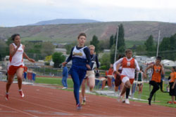 Oroville Hornet Emily Mills competes at the 2B District Championships held at Eastmont High School in East Wenatchee on Saturday, May 21. Mills and her fellow Hornets on the girls’ team took the District Championship. She was first in the 100, 200 and 4