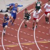 Tonasket junior John Stedtfeld charges toward junior Kris Marthini to hand-off the final round of the men’s 4x100 relay at the 1A State Track Meet in Cheney at Eastern Washington University on Saturday, May 28. Photo by Bob Thornton