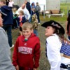 Members of the “Chesaw Cheaters,” including Chesaw Rodeo Queen Kristana, pass a ball from one to another as part of the Challenge Games held at this year’s Molson Midsummer Festival held last Saturday. The Cheaters won this challenge, but came in se