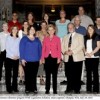 Oroville sixth-grade teacher Jacqueline Marshall (left of Gov. Chris Gregoir, who is center front) and Oroville High School social studies teacher Kelsey Cleveland (second to right of the governor) at the Legislative Scholars Program held in Olympia last