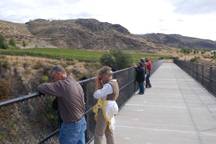 Those on the field trip last Sunday, Sept. 18 stop to take in the view of the Similkameen River on the refurbished steel girder bridge that is now part of the Similkameen Connector Trail. In addition to the river, those crossing the bridge can take in vie