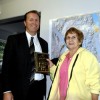 Oroville School Superintendent Steve Quick presents a plaque of appreciation to Jane Lynch for her 41 years of service to the Oroville School District. Lynch recently retired as a school bus driver. Photo by Gary DeVon