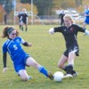 Bayle Tyus makes a tackle at midfield during Tonasket's 2-0 district tournament loss at Cascade.
