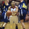 Photo by Brent Baker — Callie Barker (left) and Sierra Speiker try to contain Lake Roosevelt's Jada Desautel during Friday's loss to the Raiders.