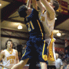 Photo by Brent Baker — Connor Hughes (21) and the Hornets had no answer for 6-8 Ty Egbert, who kept Oroville from scoring many points in the paint during Friday's contest.