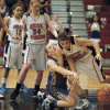 Photo by Brent Baker — Devan Utt battles with Omak's Shawnee Covington for a loose ball during the Tigers' loss to the Pioneers on Jan. 19.