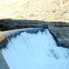 The spillway at Enloe Dam as viewed from the west side of the river. The dam, originally built in the 1920s, has not produced electric power since the late 1950's. The Dam was constructed on top of a natural 18-foot falls. Photo by Gary DeVon
