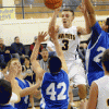 Oroville's CJ Mathews heads skyward for a two-point jumper against the Trojans. Mathews had 12 points against Manson. In the previous match up against the Trojans Mathews had a triple double.