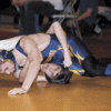 Photo by Brent Baker — The Hornets' Alex Kelly battled through a painful back injury to clinch a spot at next week's eastern regional tournament before settling for a sixth-place finish on Saturday.