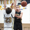 C.J. Mathews spots a teammate for an open layup during the Hornets' 66-52 upset of Riverside Christian on Monday, Feb. 13.