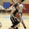 Photo by Brent BakerWhite Swan's physical defense gave Briana Moralez (1) and the Hornets fits early on, but Oroville adjusted to the Cougars' style of play and were only outscored by nine points in the final three quarters of Monday's loss.