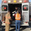 One of the children who was sent to the hospital as a precautionary measure was transported by the Tonasket ambulance, which responded to the accident in addition to the Oroville units and their crews. photo by Gary DeVon