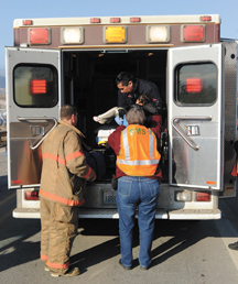One of the children who was sent to the hospital as a precautionary measure was transported by the Tonasket ambulance, which responded to the accident in addition to the Oroville units and their crews. photo by Gary DeVon