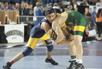 Photo by Brent Baker - The Hornets' Alex Alvarez scored a 16-5 victory over Darrington's Forrest Thompson in opening-round action at the state 1B/2B wrestling tournament on Friday, Feb. 17.