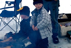 No Fish to Fry: When there's no fish to fry why not try cooking up the bait? That's what James and Josh Gasho did at last Saturday's NW Ice Fishing Festival on Sidley Lake. The two seven-year-olds roasted (or is that smoked) some mini-marshmellows on the 