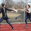 Submitted photo - Oroville's Callie Barker hands off to Kaitlyn Grunst at Ephrata on March 24.