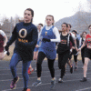 Photo by Brent Baker - Oroville's Sierra Speiker shook off an early challenge from Tonasket's Kylie Dellinger to win the 1600-meter run at the March 31 Eagle Home Mortgage Invitational.