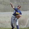 Amber Monroe fires a throw from shortstop during Saturday's doubleheader with Omak.
