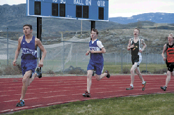 Tonasket's Ryker Marchand and Adam Halvorsen compete in the 1600 meter run at the Tigers' invitational.