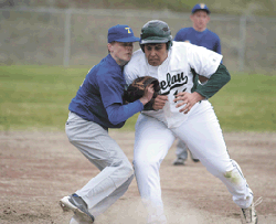 Brent Baker / staff photoTonasket's Kjeld Williams was injured in a collision at third base during the Tigers' loss to Chelan last Tuesday.
