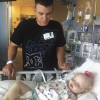 Two days after donating one of his kidneys to his daughter, Hayden, Adam Brazil stands by her side.