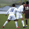 Brent Baker / staff photo — Matilde Pacheca celebrates with Jesus Alvarez (11) after Pacheca scored the equalizing goal late in the first half of Thursday's upset victory over Okanogan.