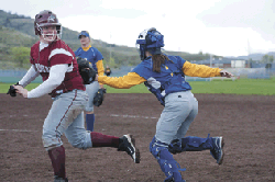 Brent Baker / staff photo — Tonasket catcher Mackenzie Wheeler chases down an Okanogan baserunner during Friday's season-ending doubleheader.