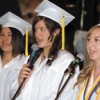 Jasmine Grangroth, Cierra Williams and Co-Valedictorian Michelle Timmerman sing the National Anthem to open Saturday's graduation.
