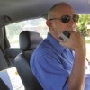 Detective Mike Murray of the Okanogan County Sheriff's office checks out of service after 39 years in law enforcement. The detective, who began his career with the Oroville Police Department retired last Friday. OCSO photo