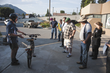 Greg Howard, owner/engineer of Okanogan County Motorized Bicycles, shows the mayor and council  one of his  motorized bikes which he said would be good for a police bike patrol. The bikes cost about $800 with the motor added and can go up to 30 mph.