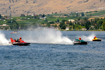 A scene from the exciting fast-paced race action during the  2010 Can Am Apple Cup Powerboat Races. Photo by Gary DeVon