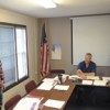 Travis Loudon is given the oath of office as the Oroville School Board's newest director at the Monday, July 30 meeting. Photo by Gary DeVon