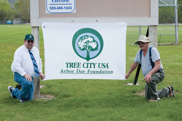 Tonasket Mayor Patrick Plumb and Councilman Dennis Brown are proud of Tonasket's status as a Tree City USA, as recognized by the Arbor Day Foundation