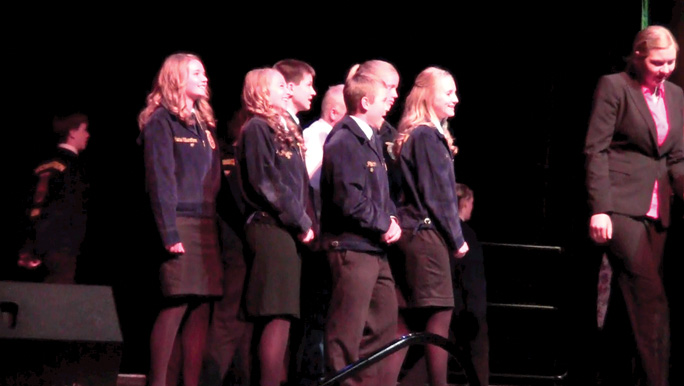 Janelle Catone, Madison Bayless, Jordan Hughes, Rade Pilkinton, Jenna Valentine and Rachel Silverthorn react as they receive their state championship trophy in Rituals at the Washington State FFA Convention last weekend.