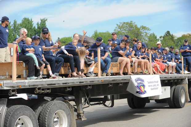 Gold Digger Growers, employees and their families were a big hit this May Festival as they threw t-shirts, hats, frisbees and candies along the parade route in honor of the growers' cooperative's 75th Anniversary. Gary DeVon/Staff Photo