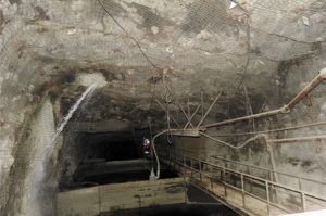 Water pours through the roof of a tunnel in Kinross' Buckhorn Mine.