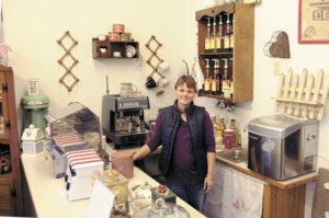 Rosa Snider, who owns Georgi's Market with her husband John. In addition to fresh, local and regional produce, the market has espresso, as well as bird and bat houses and local art for sale. Gary DeVon/staff photo