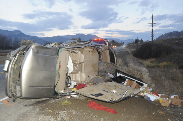 Oroville firefighters cut the roof off the Chevrolet Tahoe involved in a two-vehicle collision on Highway 97 south of Oroville. The collision, being investigated as a double DUI, sent six people, including a pedestrian, to the hospital. Gary DeVon/staff photos