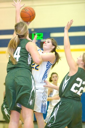 Tonasket's Carrisa Frazier tries to shoot over Chelan center Emma Stockholm during Friday's game.