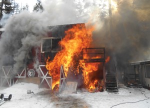 The Bonaparte Lake Resort cabin that included an upper floor studio apartment burns on Friday, Feb. 21.