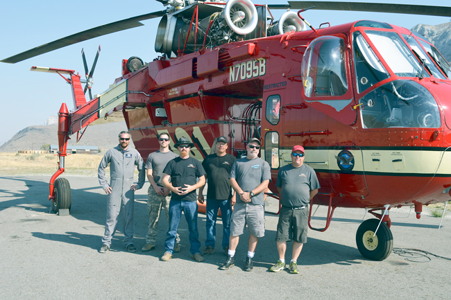 Crew members with the Sikorski CH54A include co-pilot Dave Lane, Helicopter Manager Andrew Hastings, Crew Chief Ryan Sarver, truck driver/mechanic’s helper Bud Snodgrass, pilot Dan Anderson and electrician/mechanic Joe Breazeale. Katie Teachout/staff photo 