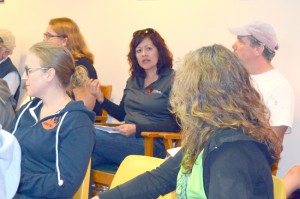 Roni Holder-Diefenbach of the Okanogan County Economic Alliance answered several questions for community members at Tonasket City Hall Monday, Aug. 31. Next to Diefenbach is Melissa Carpenter, Eastern Washington Representative from the Governor's office. Katie Teachout/staff photo.