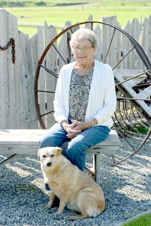 Esher Caton, this year's Founders Day Grand Marshal, lives on the family homestead that has been in her family for over 110 years with her two-year old dog, 'Dog.' Kelly Denison/Submitted photo