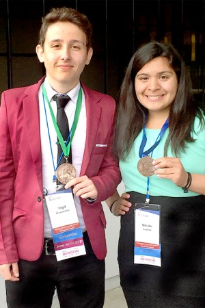 Yigit Karemis and Nichole Juarez show  off their medals for placing at the Washington State Future Business Leaders of America Conference in Spokane. The two will be heading to Atlanta, Georgia to compete at Nationals in June. Submitted photo