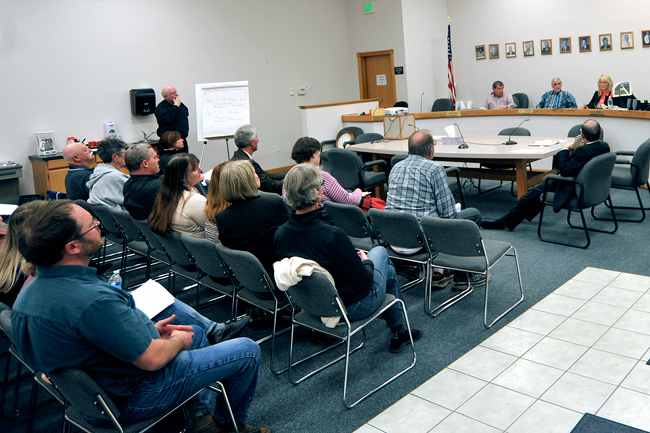 The Okanogan County Commissioners discuss options regarding Juvenile Detention Services last April at one of several meetings set up to hear  public comments. Among those that commented were Okanogan County Superior Court Judge Christopher Culp (front row, far left) and former Superior Court Judge Jack Burchard (front row, right) who recalled travelling to Medical Lake to check out Martin Hall, one of the options for Juvenile Detention under consideration by the commissioners, 14 years ago.