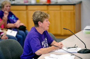Carol Richards, who is seeking a Conditional Use Permit to operate a dog kennel from her property, testifies before the Hearings Examiner Thursday. Gary De Von/staff photo