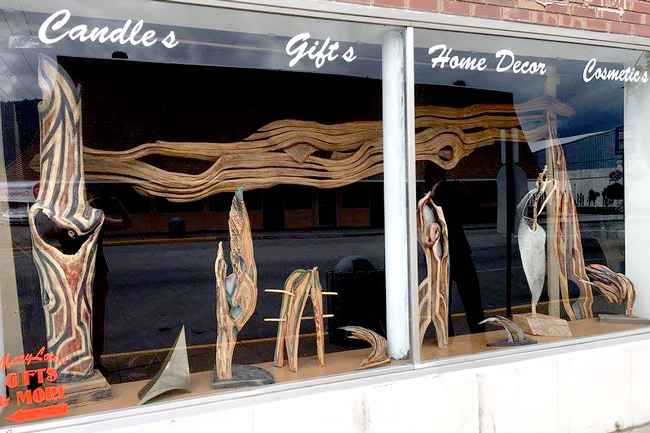 The Garrett Building (or old First National Bank /G-J Western Store) at the corner of Main and 14th streets has wooden sculptures by Dan Hulphers on display in its front windows. The 49 Degree Artist group has been filling storefront windows throughout Oroville. Submitted photo