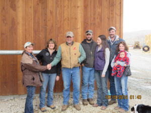 Submitted photo The family and members of the Okanogan Land Trust gathered for a picture (l-r) OLT President Cynthia Nelson, Noreen and Derek Olma, Trent and Shelby Rodgers and Austin, Nadine and Zane Olma.